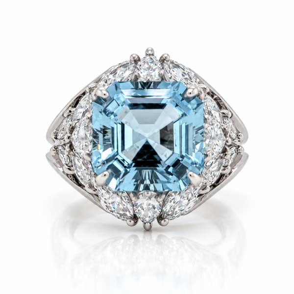 18ct White gold ring featuring a centre square emerald cut aquamarine with a bouquet of diamonds