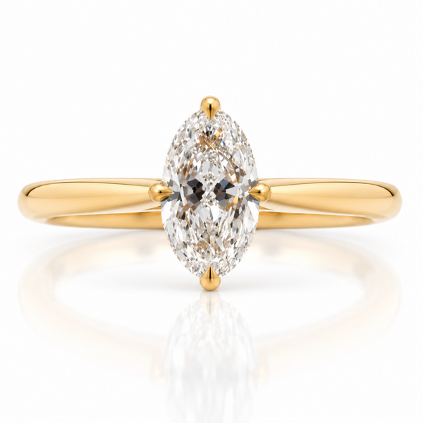 Oval diamond in a solitaire set with four claws