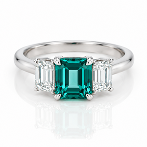 1.25ct Emerald and Diamond Trilogy Ring