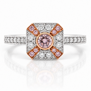 Platinum and 18ct rose gold ring with centre argyle pink diamond and halo of diamonds