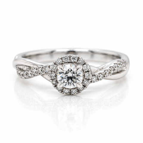 18ct White gold ring with a twist band and diamond halo