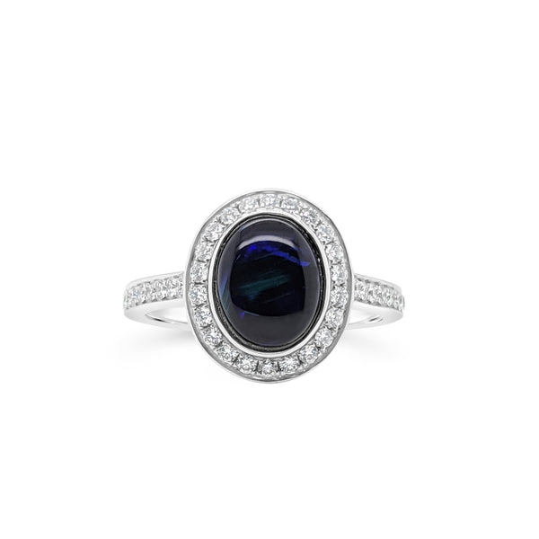 Oval shape Opal and Diamond halo ring