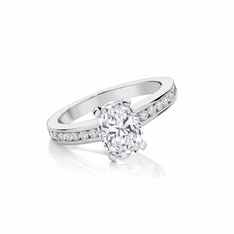 Four Claw Oval Engagement Ring with Channel set Diamonds