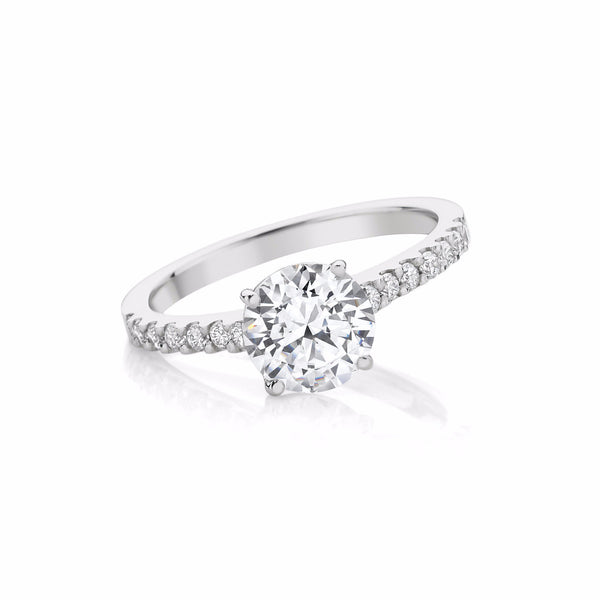 Four Claw Diamond Engagement Ring with Nova set Diamonds