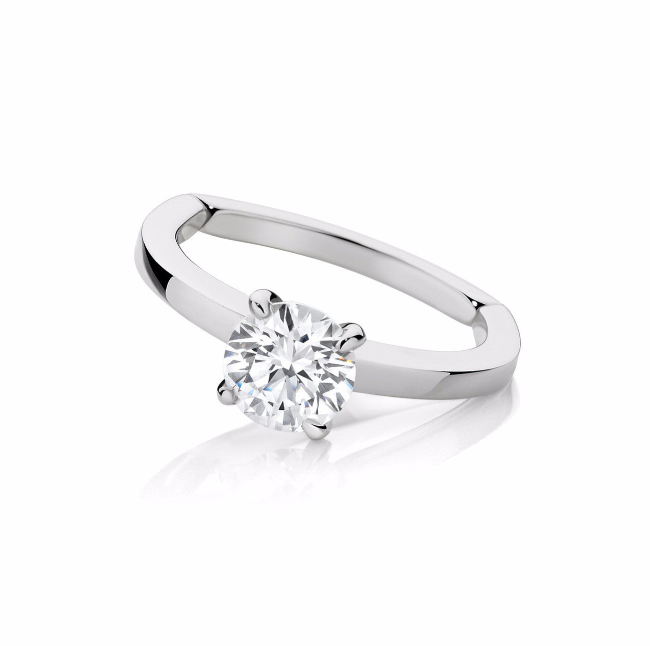 Four Claw Brilliant Engagement Ring