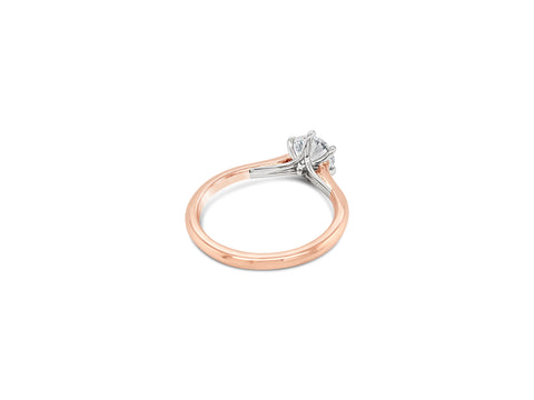 Platinum and Rose Gold Crossover Engagement Ring